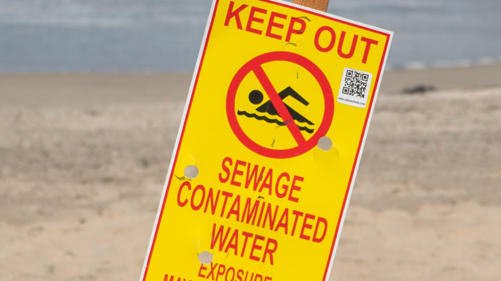 Aviso de água contaminada. (Esgoto) 